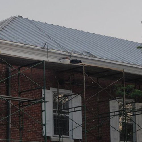 Commercial Retail Building in the Ligonier Diamond featuring a standing seam metal roof